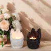 Elegant Lotus-in-Hand Resin Candlestick in Black or White