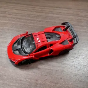 Red 1:43 Die-Cast Racing Car with Opening Doors 10 S659a9ce5198346e2aec58fb3f66886cbY 1