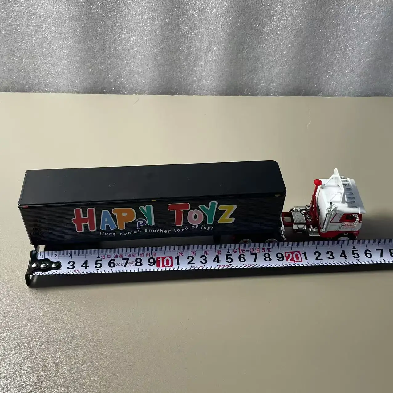 1:64 Diecast Freightliner Truck Model with Vibrant Trailer 4 1:64 Diecast Freightliner Truck Model with Vibrant Trailer - Image 4