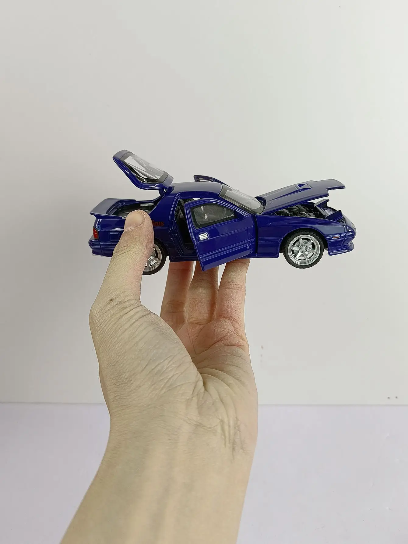 Vibrant Yellow Mazda RX-7 1:32 Diecast Model 6 Vibrant Yellow Mazda RX-7 1:32 Diecast Model - Image 6