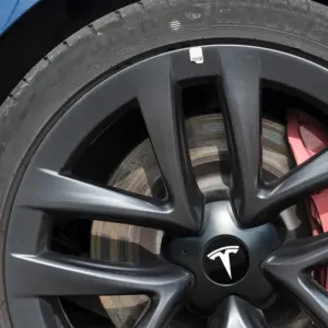 Tesla 56mm Aluminum Hub Cap Stickers Set 12 S7ada08f625c6453ead6095e4ce438a58y 1