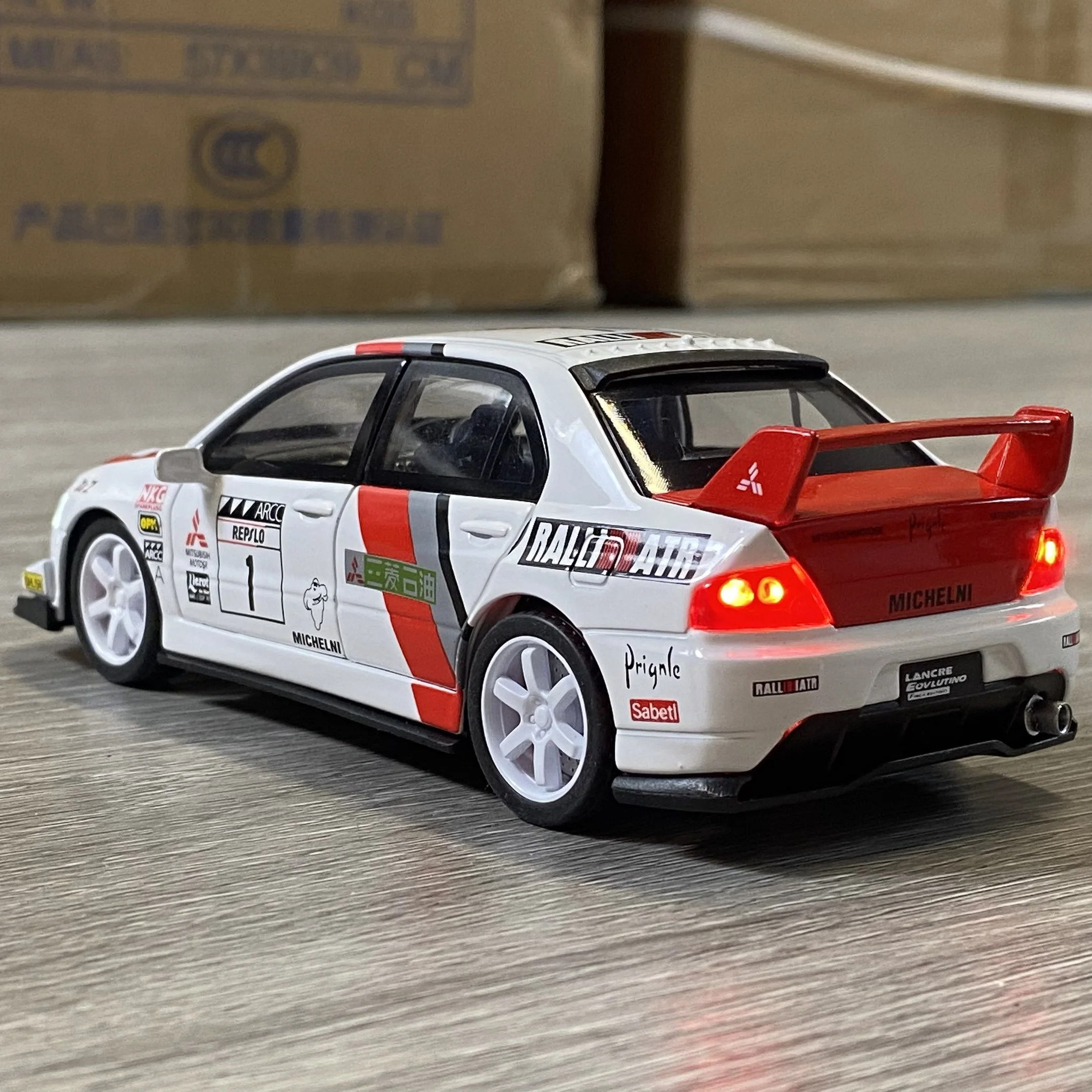 Realistic White Mitsubishi Lancer EVO Model 1:32 Scale 5 Realistic White Mitsubishi Lancer EVO Model 1:32 Scale - Image 5