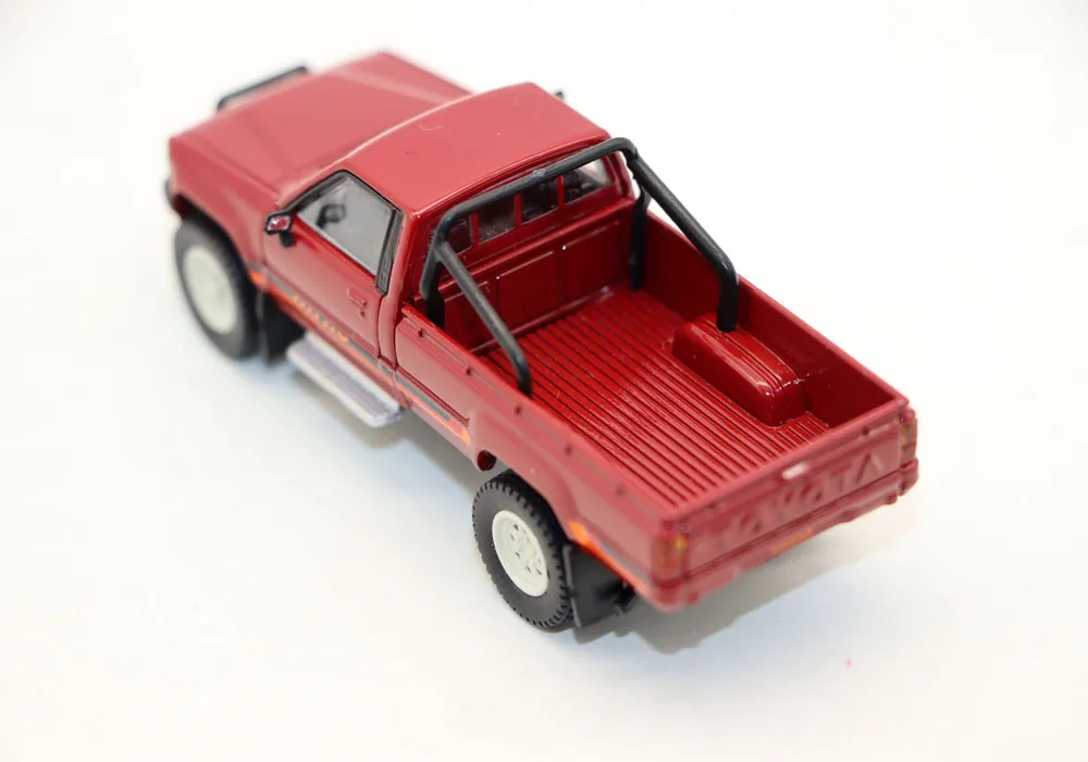 Vibrant Red 1984 Toyota Hilux Diecast Model 3 Vibrant Red 1984 Toyota Hilux Diecast Model - Image 3