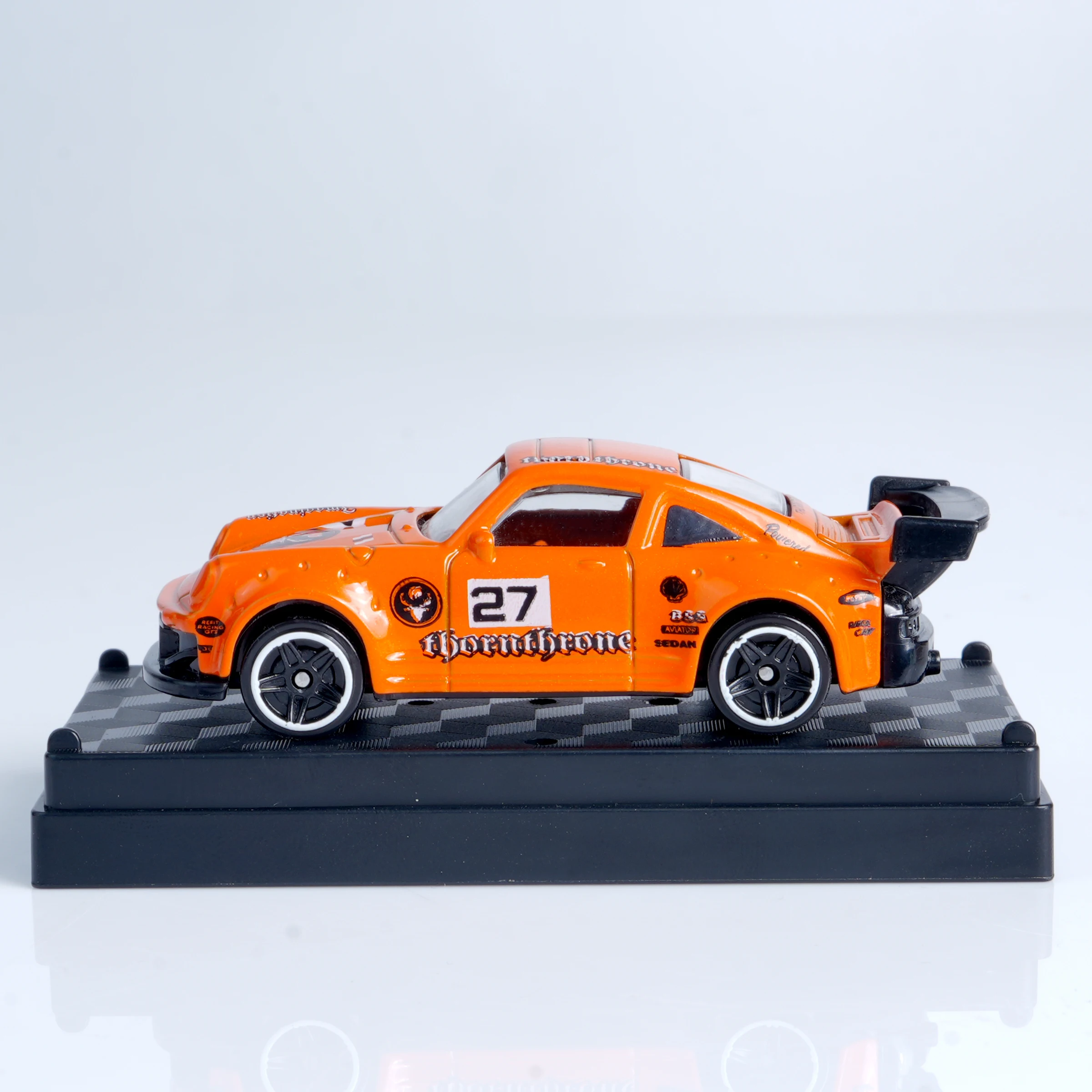 Vibrant 1:64 Orange Die-Cast Racing Car 2 Vibrant 1:64 Orange Die-Cast Racing Car - Image 2