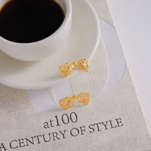 Stainless Steel Lace Bowknot Earrings 12 S8b3fe6456fa14695a7c38245a96b5bbfo