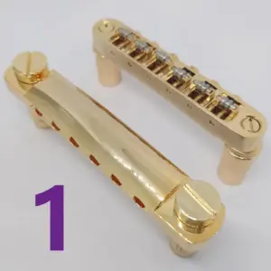 Gold Tune-o-Matic Bridge and Tailpiece Set for LP/SG 13 S8d9b94b0e9334f81ad9654e2f8eb8b01q