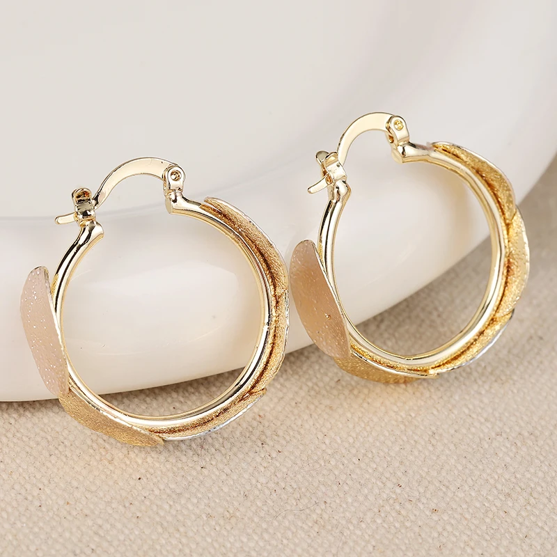 Geometric Oval Hoop Earrings in Silver & Gold 5 Geometric Oval Hoop Earrings in Silver & Gold - Image 5