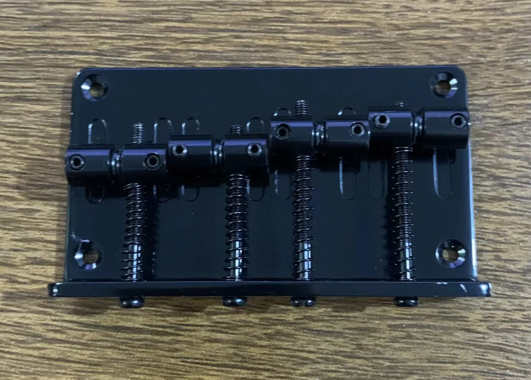 Professional 4-String Bass Guitar Bridge with Finishes 2 Professional 4-String Bass Guitar Bridge with Finishes - Image 2