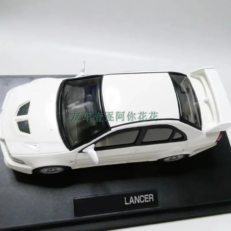 White Mitsubishi Lancer Evolution Diecast Model 3 White Mitsubishi Lancer Evolution Diecast Model - Image 3