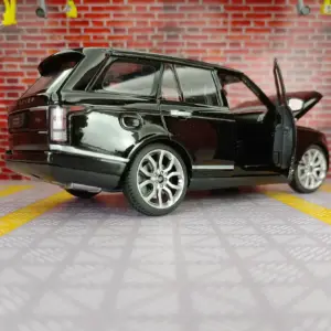 Land Rover Range Rover 1:24 Diecast Model in Black, White, or Red 10 Saf526f6c1a494d2585be538d9796b4f2O