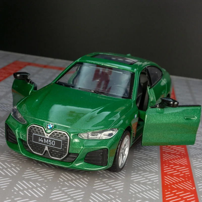 BMW I4 M50 Diecast Model 1:34 Scale with Charging Station 4 BMW I4 M50 Diecast Model 1:34 Scale with Charging Station - Image 4