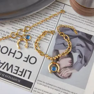 Gold Stainless Steel Bracelet with Blue Horseshoe Pendant 13 Sc9cc25c10fc6417f882fbada9739ccdeo