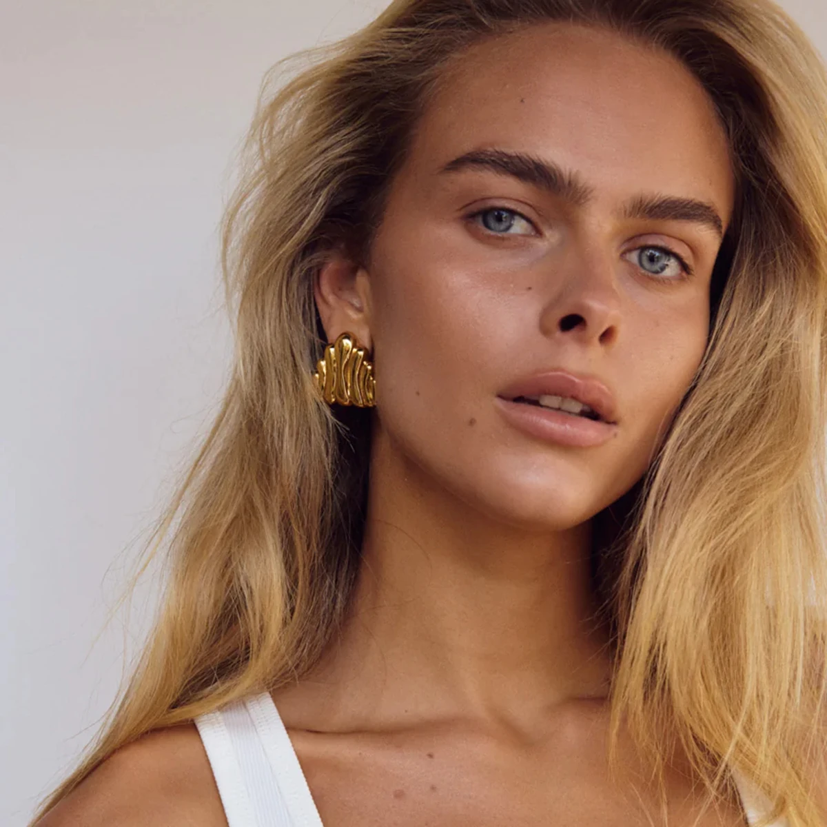 Modern Gold-Toned Stainless Steel Wave Earrings 2 Modern Gold-Toned Stainless Steel Wave Earrings - Image 2