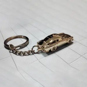 Gold Aston Martin DB5 Keychain for Collectors 6 Sd1d3e3a3990f4537b3890e193ac9cac49