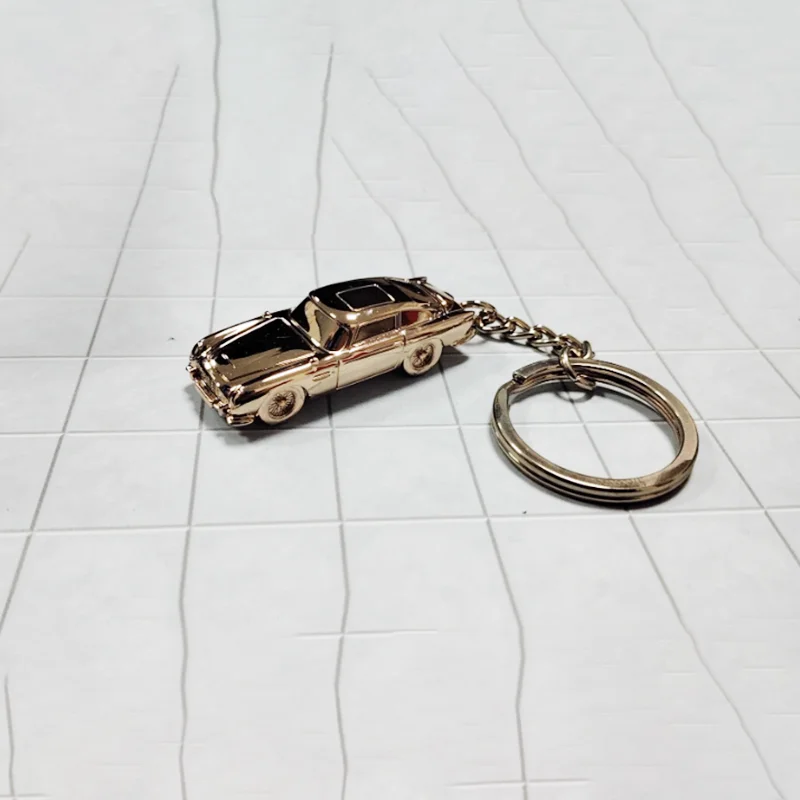 Gold Aston Martin DB5 Keychain for Collectors 2 Gold Aston Martin DB5 Keychain for Collectors - Image 2