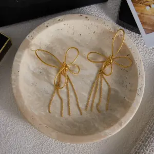 Stainless Steel Bow Earrings Model JDE0107006 12 Se5c72b4181f0410f8fda8492f6b558a5C