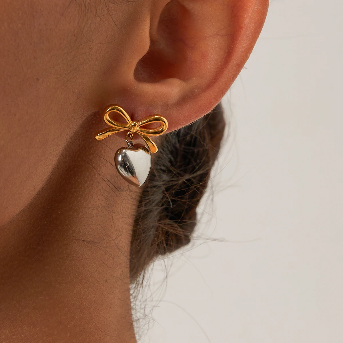 Elegant Gold-Tone Stainless Steel Bow Heart Earrings 4 Elegant Gold-Tone Stainless Steel Bow Heart Earrings - Image 4