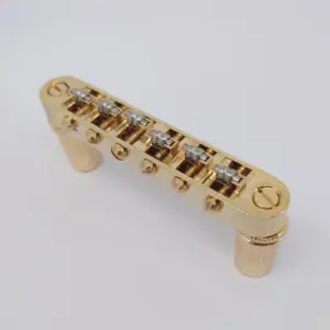Gold Tune-o-Matic Bridge and Tailpiece Set for LP/SG 14 Sf3d8fa6455c44ac7b4f5321e2bad5113P