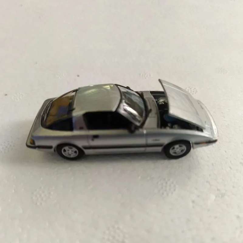 Silver 1982 Mazda RX-7 Diecast Model 1/64 Scale 6 Silver 1982 Mazda RX-7 Diecast Model 1/64 Scale - Image 6