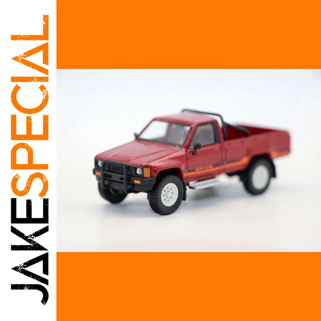 Vibrant Red 1984 Toyota Hilux Diecast Model 1 Vibrant Red 1984 Toyota Hilux Diecast Model