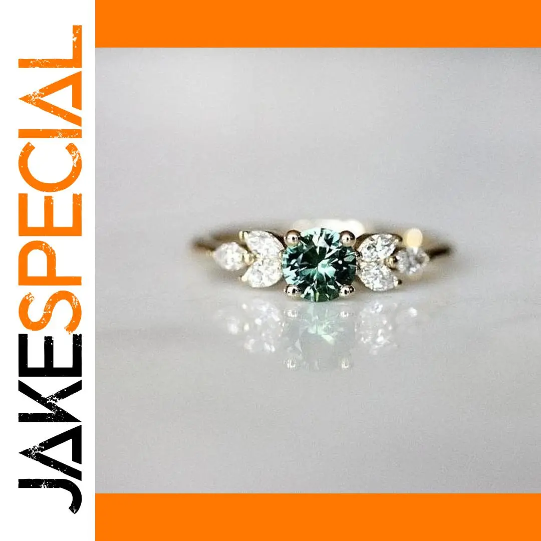 Gold Women's Ring with Green Gem and Zircon Accents 1 Gold Women's Ring with Green Gem and Zircon Accents