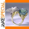 Elegant Blue Sea Cocktail Ring with Hummingbird