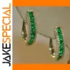 Elegant Gold Hoop Earrings with Green Zircon