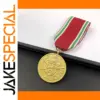 Golden Commemorative Medal with Ribbon