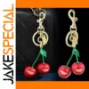 Vibrant Red Cherry Keychain with Cartoon Faces
