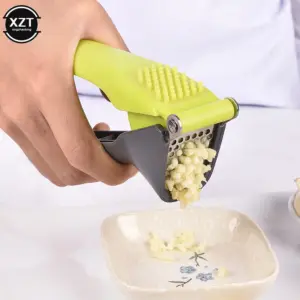 Bright Green and Gray Handheld Garlic Press 11 S1fd12cf29e094d3489801e3d6439ea81Q