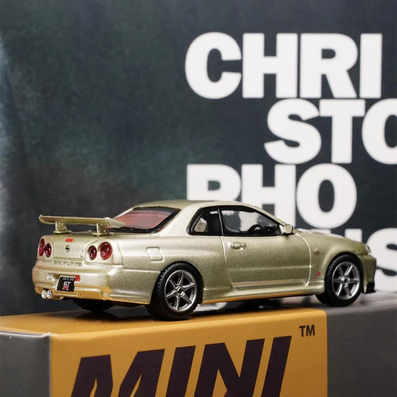 Gold Nissan Skyline GTR R34 Diecast Model 2 Gold Nissan Skyline GTR R34 Diecast Model - Image 2
