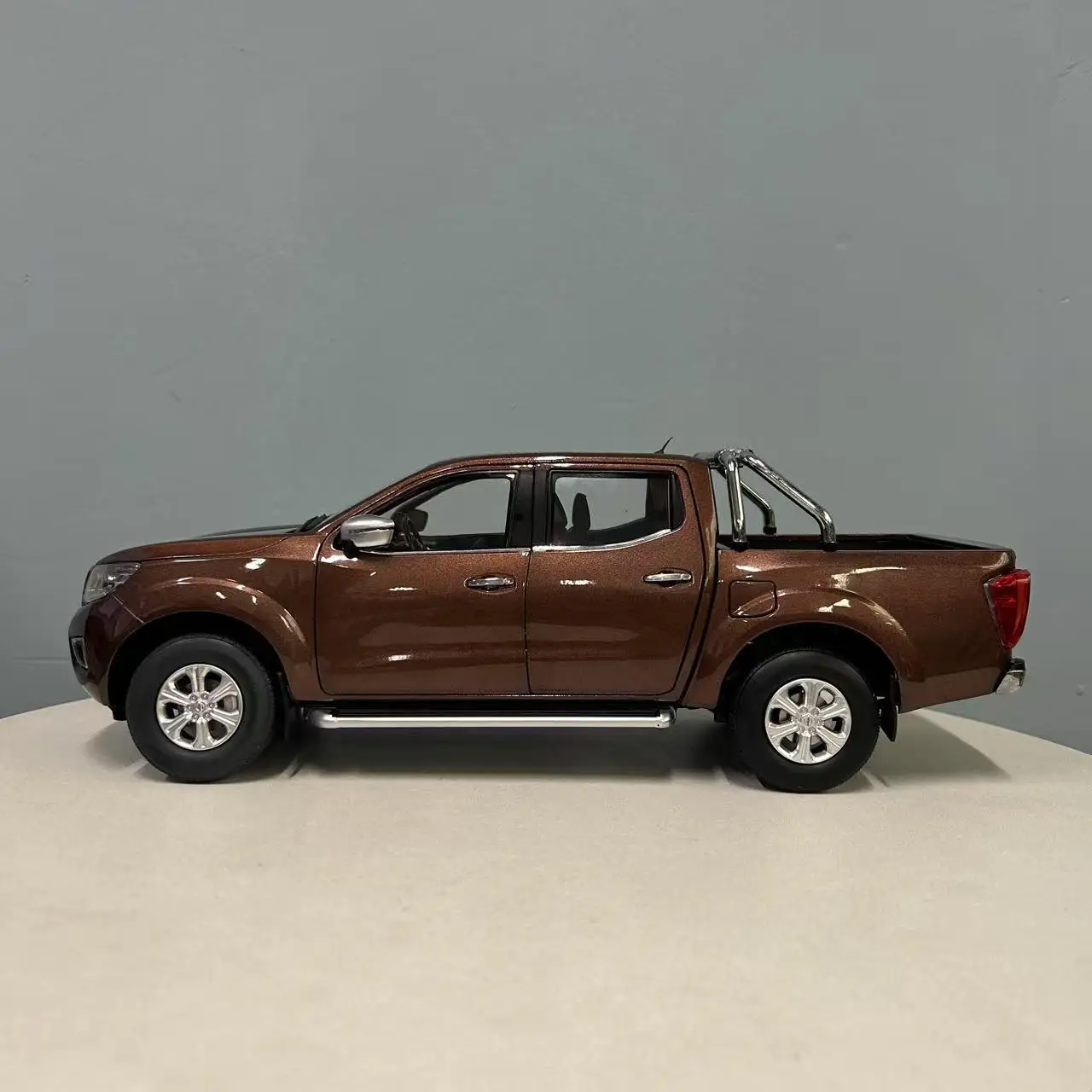 1:18 Nissan Navara Pickup Model in Metallic Brown 3 1:18 Nissan Navara Pickup Model in Metallic Brown - Image 3