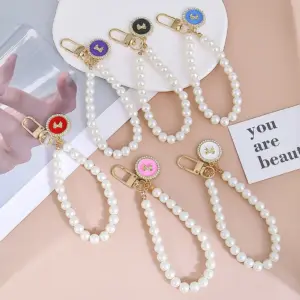 Elegant Faux Pearl and Rose Gold Keychain