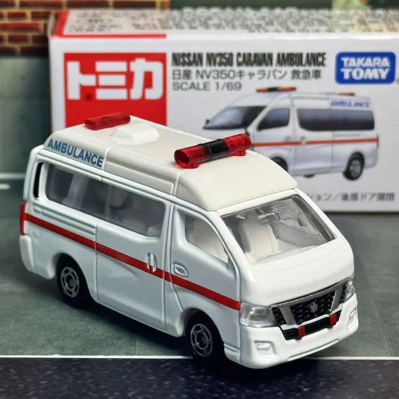 Takara Tomy Nissan NV350 Ambulance Model 1:64 Scale 6 Takara Tomy Nissan NV350 Ambulance Model 1:64 Scale - Image 6
