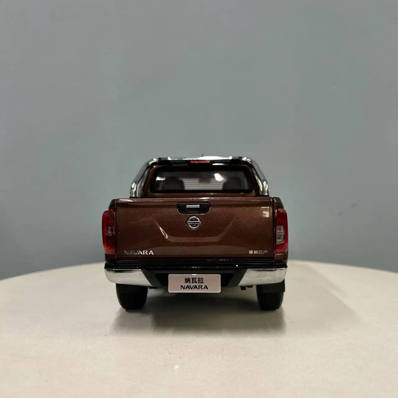 1:18 Nissan Navara Pickup Model in Metallic Brown 6 1:18 Nissan Navara Pickup Model in Metallic Brown - Image 6