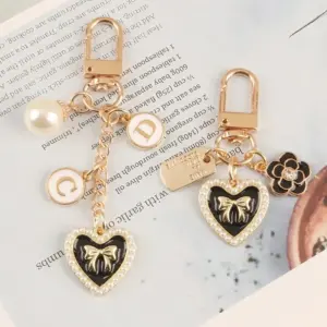Pearl Heart Keychain with Camellia Bowknot 12 S41e0afb9644c41dd992e1997a9eac315y