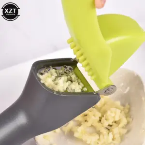 Bright Green and Gray Handheld Garlic Press 9 S502f74b9806d40a3ac681e4c77167ec50
