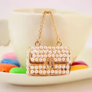 Gold Miniature Handbag Keychain with Faux Pearls 7 S5ca7b6e9359546a289f75a94b5cccd2a9