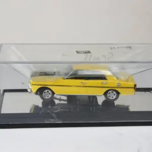 Vibrant Yellow Vintage Diecast Car in Organic Glass 3 S651a7aec8392499ea550acc1c021bb43F