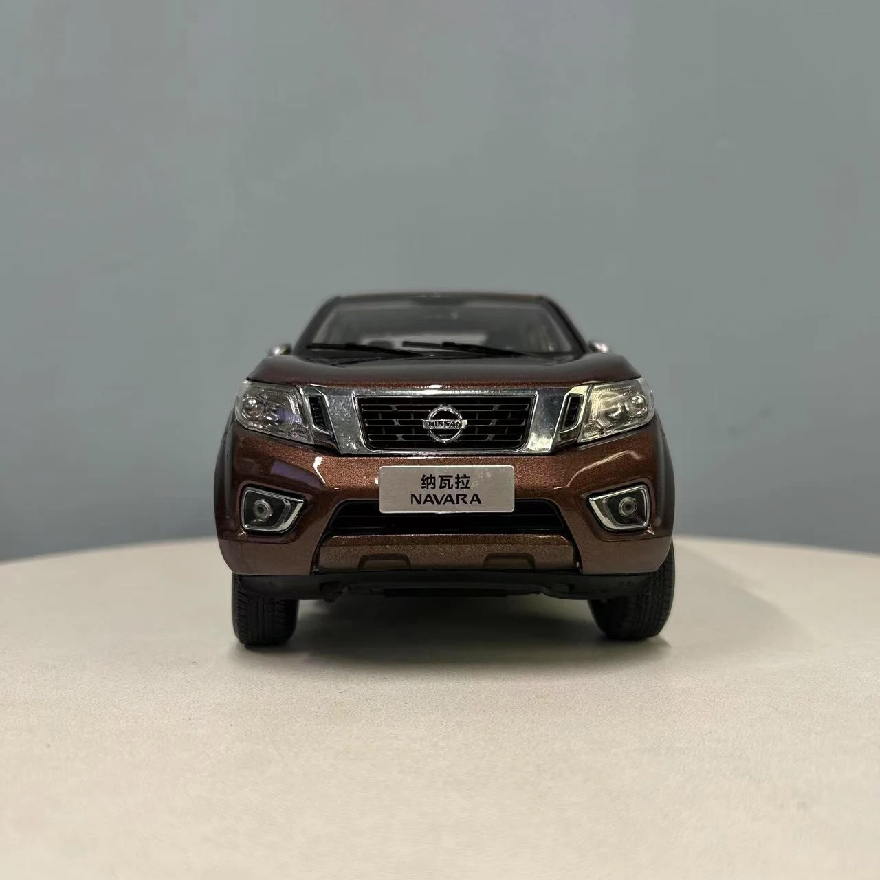 1:18 Nissan Navara Pickup Model in Metallic Brown 5 1:18 Nissan Navara Pickup Model in Metallic Brown - Image 5