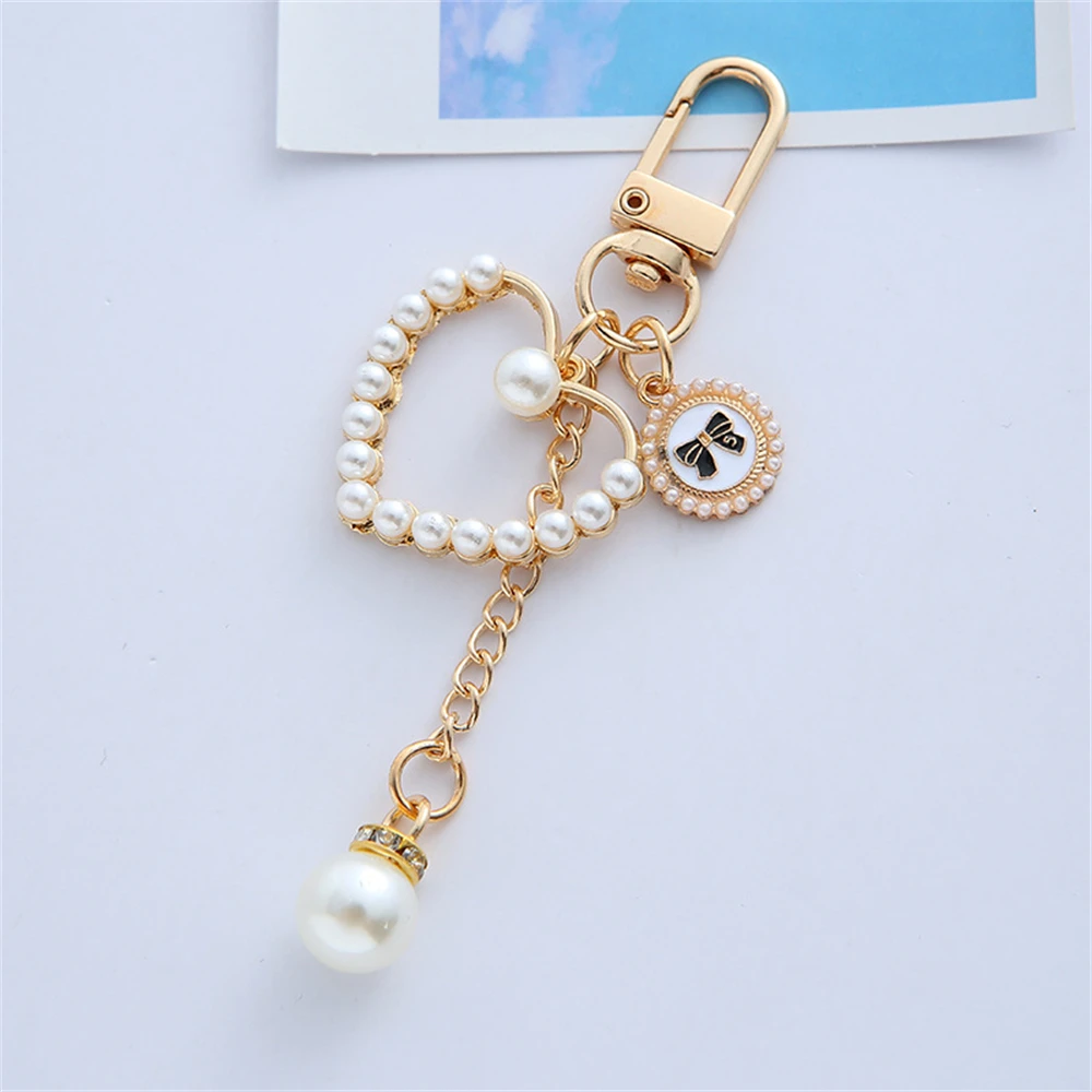 Pearl Heart Keychain with Camellia Bowknot 7 Pearl Heart Keychain with Camellia Bowknot - Image 7