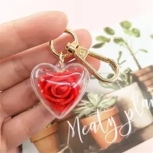 Heart-Shaped Resin Keychain with Rose Pendant