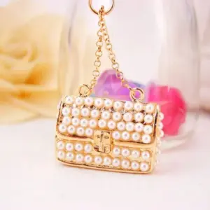 Gold Miniature Handbag Keychain with Faux Pearls 8 Sad956d2b84a4435487349ebc58f07a903