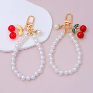 Pearl Chain Keychain with Cherry Charm 13 Sbeab0c65adc444fb8ae7c8c51ff92141d