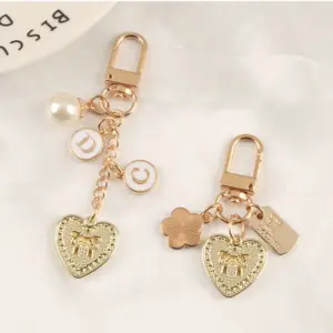 Pearl Heart Keychain with Camellia Bowknot 14 Sc282c71dd3e243019715db49acf67740M