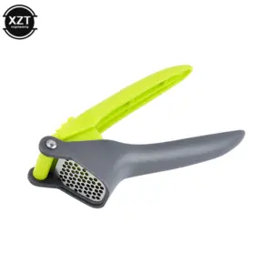 Bright Green and Gray Handheld Garlic Press