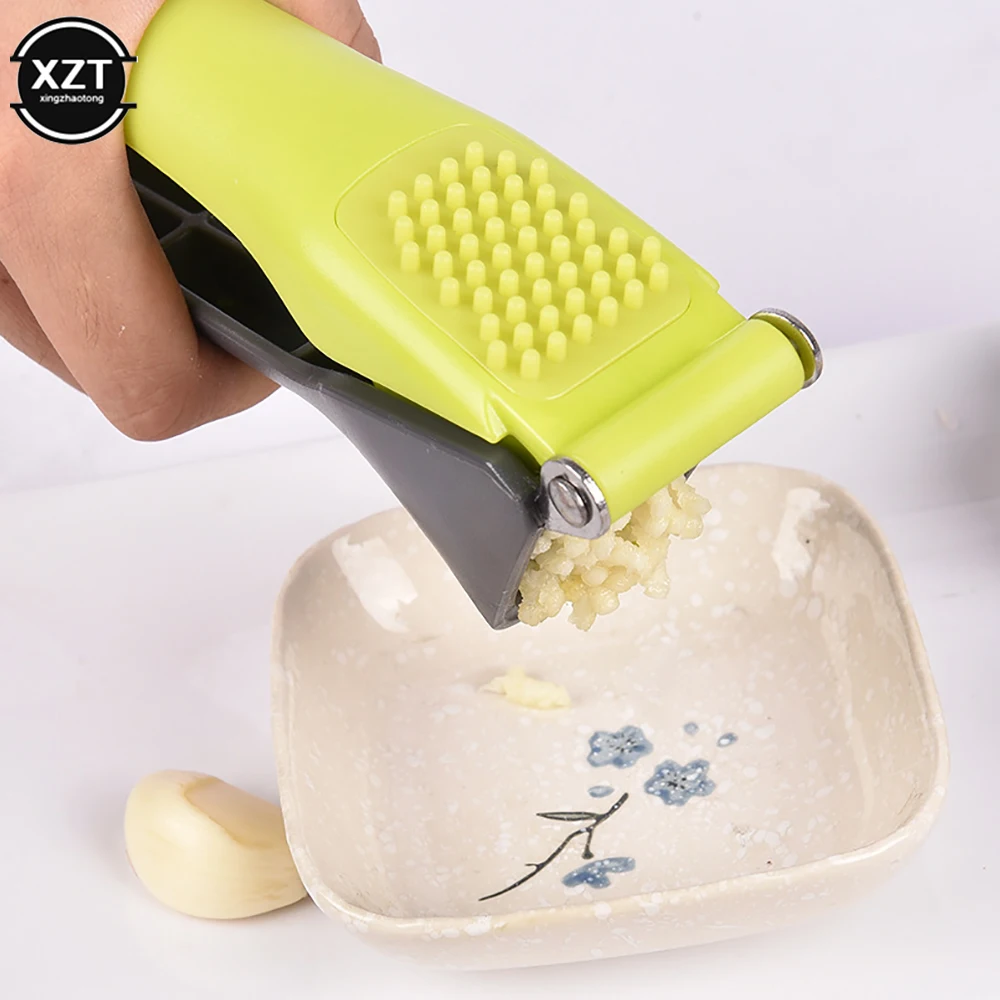 Bright Green and Gray Handheld Garlic Press 5 Bright Green and Gray Handheld Garlic Press - Image 5
