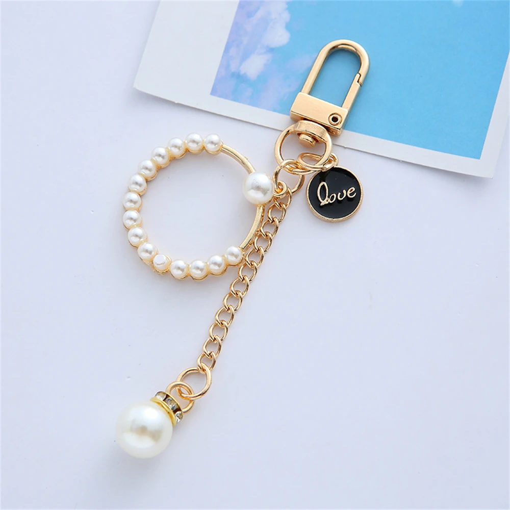 Pearl Heart Keychain with Camellia Bowknot 9 Pearl Heart Keychain with Camellia Bowknot - Image 9