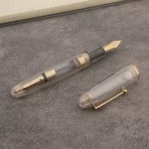 Transparent White Acrylic Fountain Pen with Gold Accents 9 Sc7b3d121c2c14549b4872cf700483bdb8