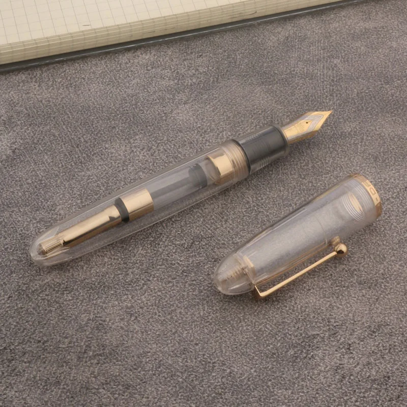 Transparent White Acrylic Fountain Pen with Gold Accents 4 Transparent White Acrylic Fountain Pen with Gold Accents - Image 4